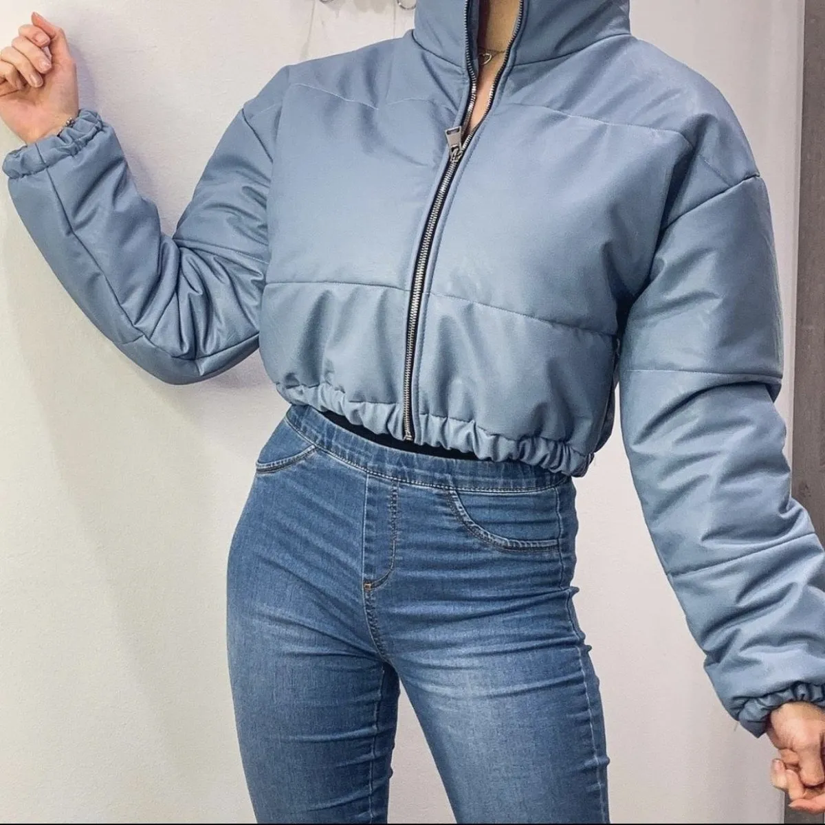 Blue faux leather bomber.