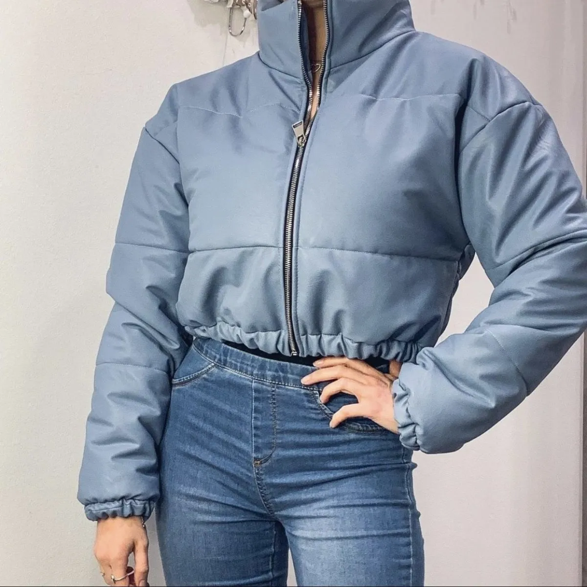 Blue faux leather bomber.