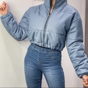 Blue faux leather bomber.