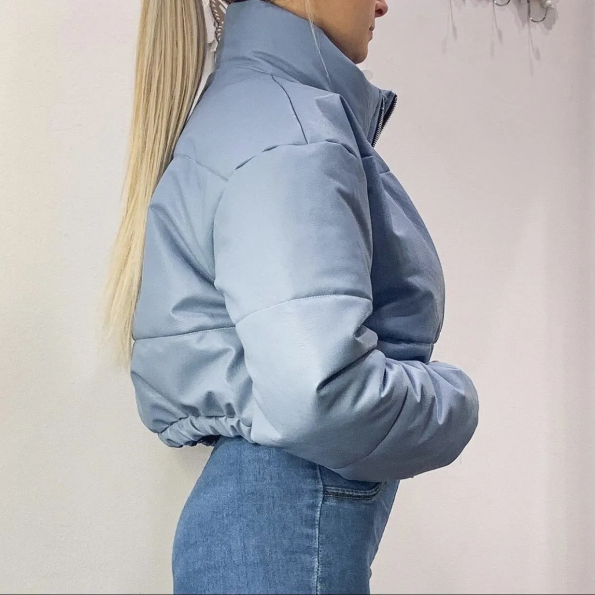 Blue faux leather bomber.