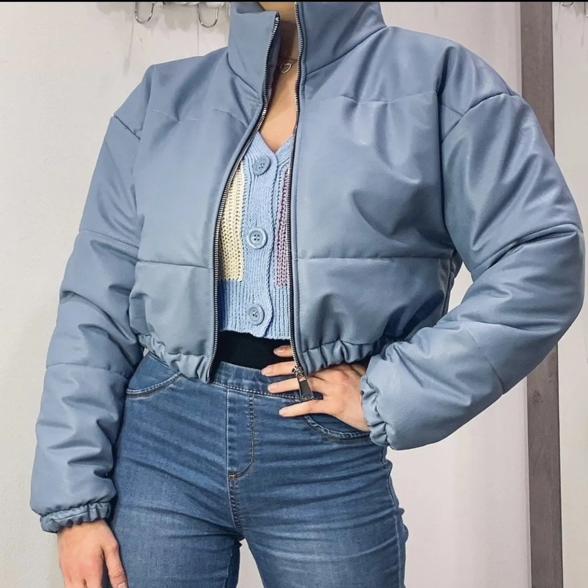 Blue faux leather bomber.