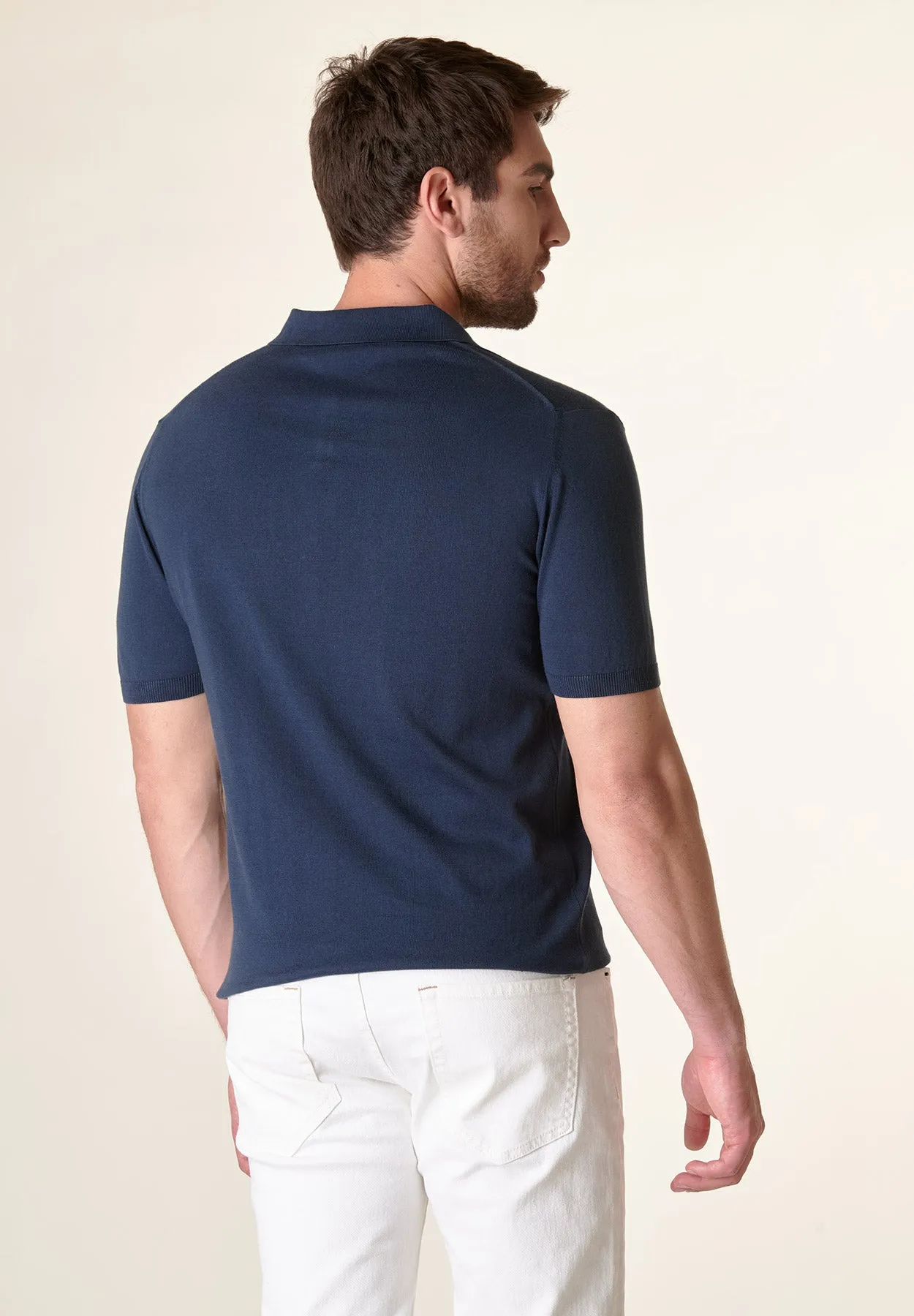 Blue polo shirt with derby collar buttons