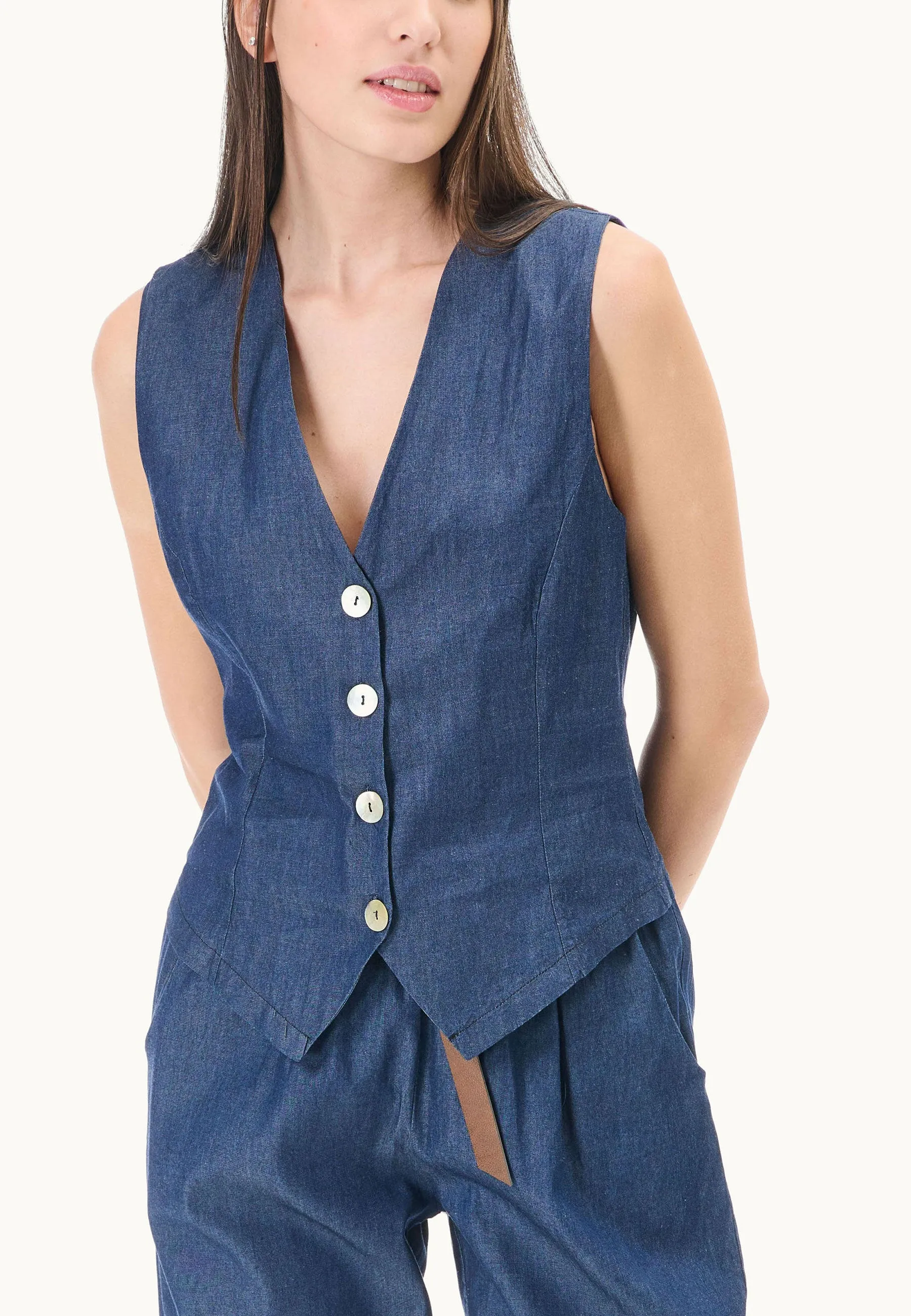 Chambray vest with buttons - available for purchase.