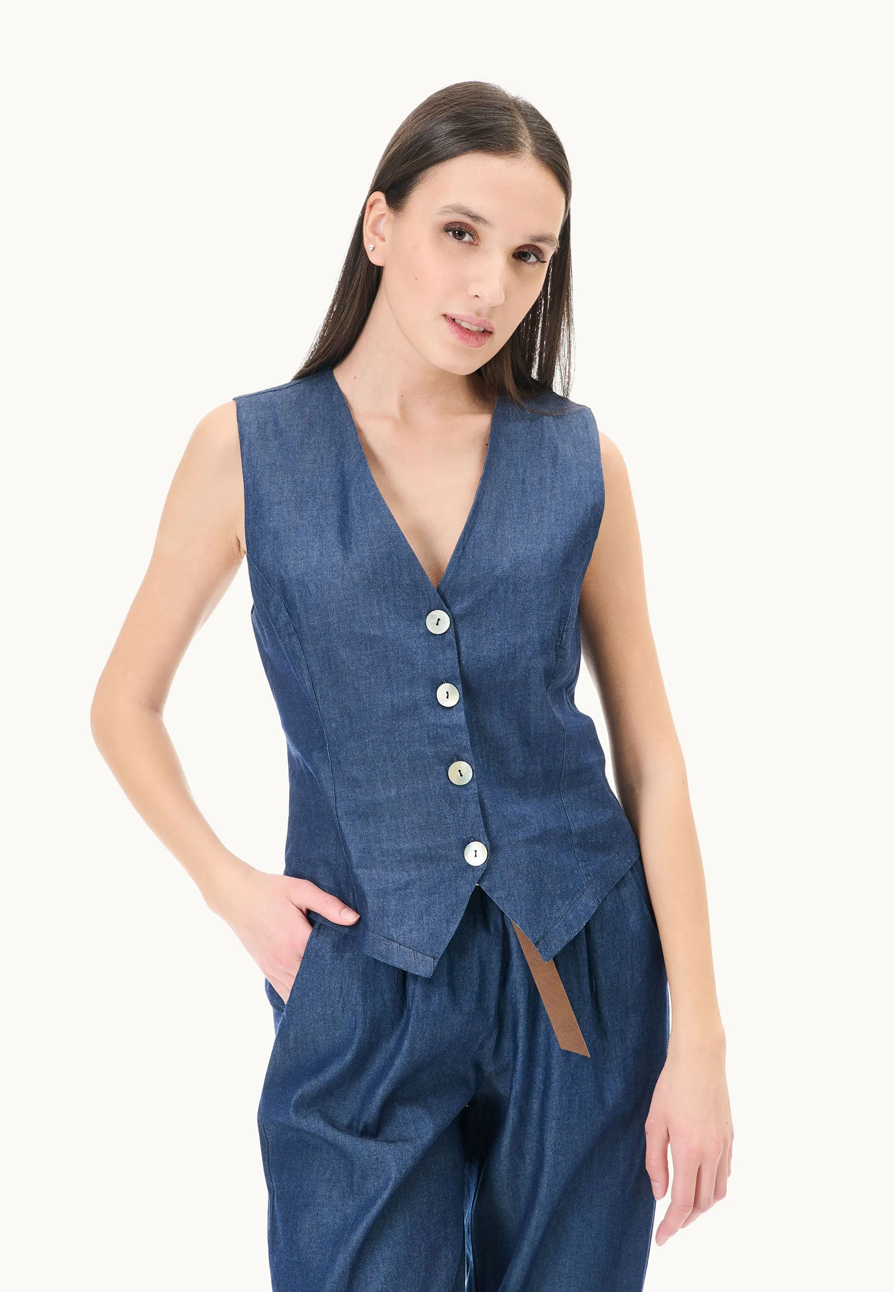 Chambray vest with buttons - available for purchase.