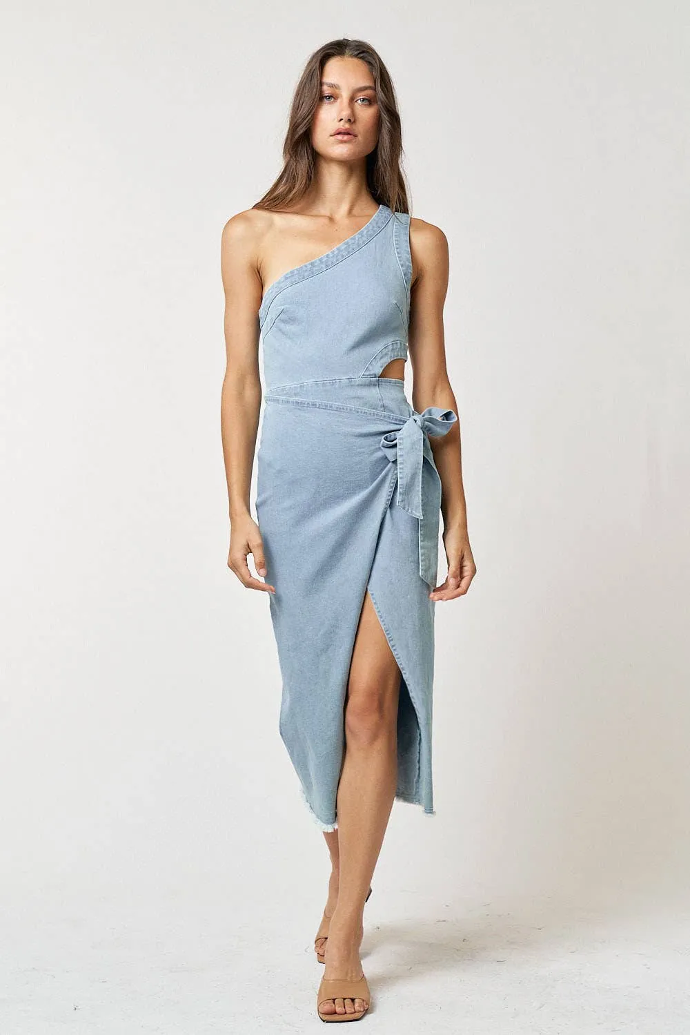 Denim one shoulder dress with cut out details and midi length.