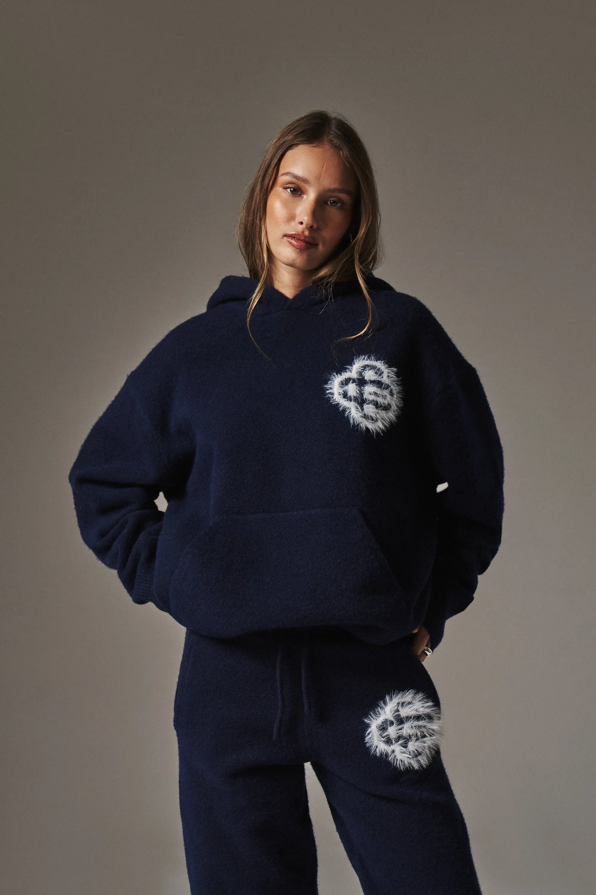 FLUFFY EMBLEM KNITTED HOODIE - NAVY