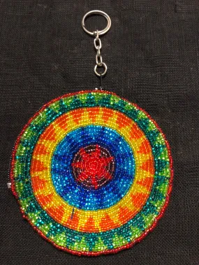 Guatemalan handcrafted glass bead round change purse with key ring. 3.5” diameter.