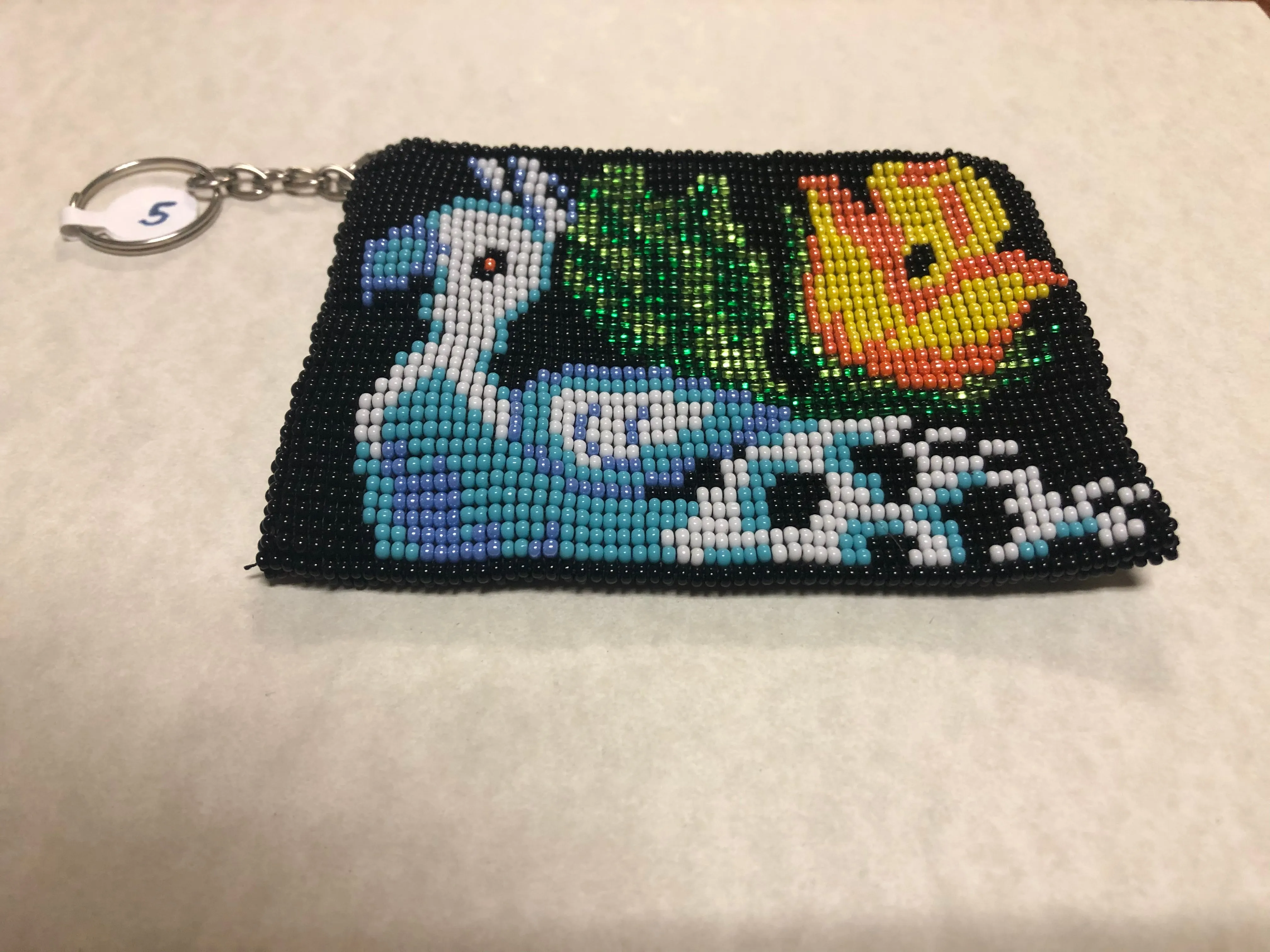 Guatemalan handcrafted glass seed bead change purse.