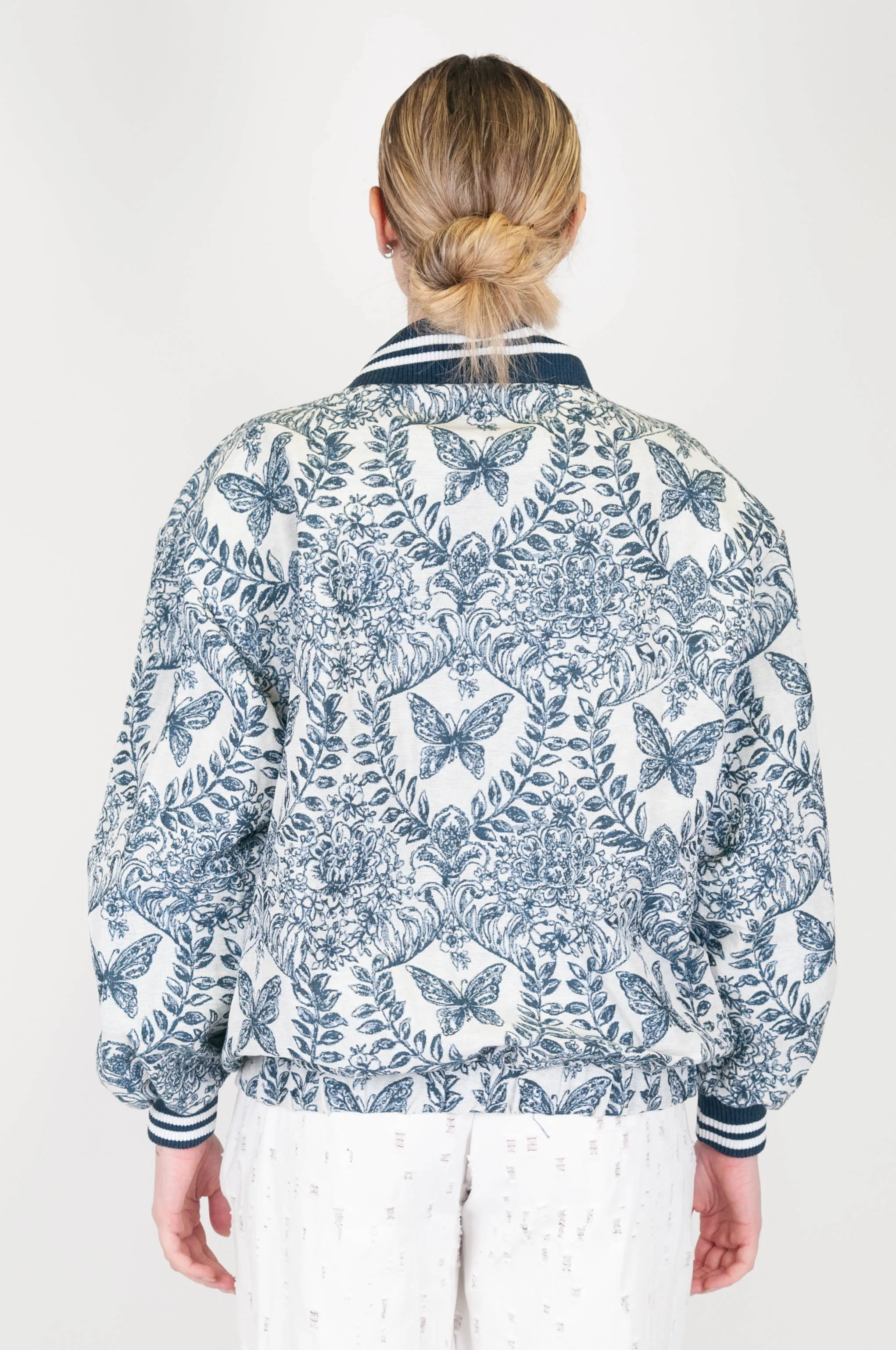 Motel - Abstract patterned bomber jacket with contrasting accents.